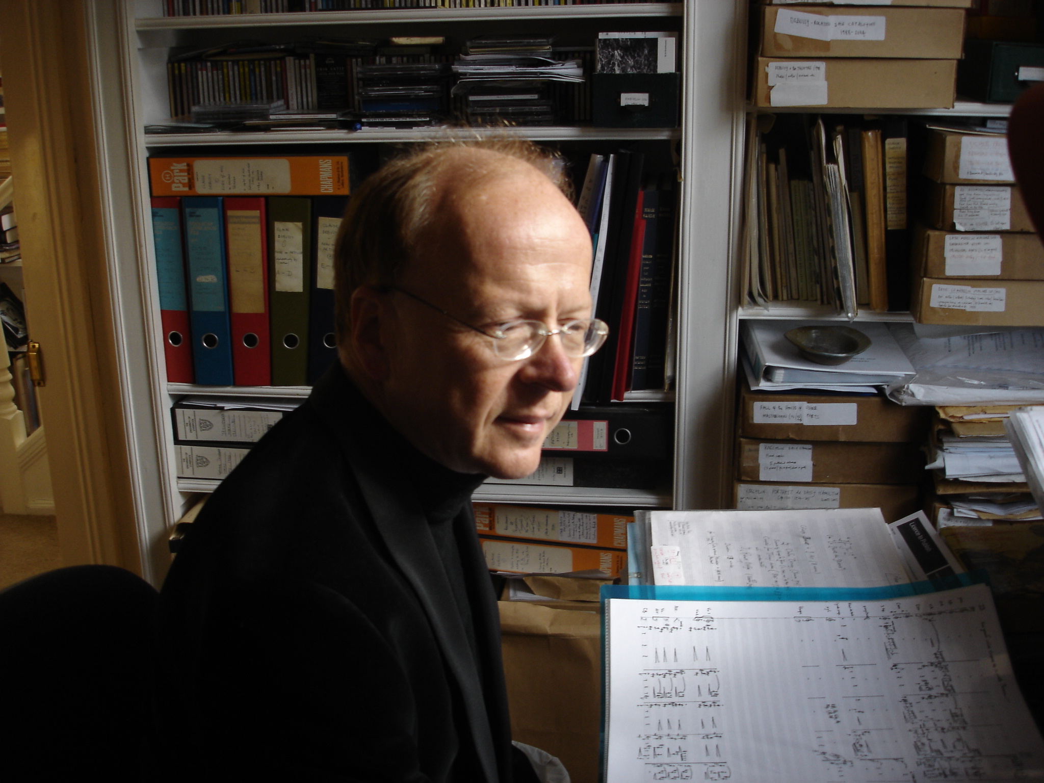 Robert Orledge working among his scores and papers